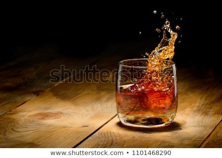 Stock photo: Whiskey Pouring Into Glass