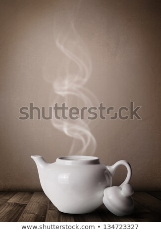 [[stock_photo]]: Tea Pot With Abstract White Steam