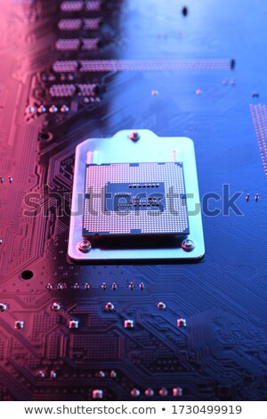 [[stock_photo]]: Computer Cpu Chip On Red Mainboard