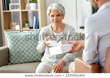 ストックフォト: Psychologist Giving Tissues To Senior Woman Client