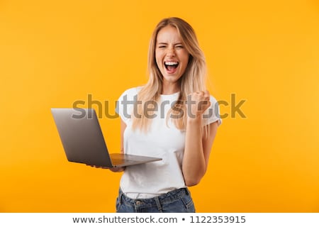 Foto stock: Cute Young Woman With Laptop