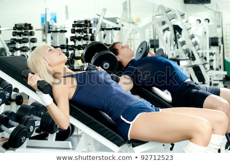 Foto stock: Lying Boy In Sports Hall