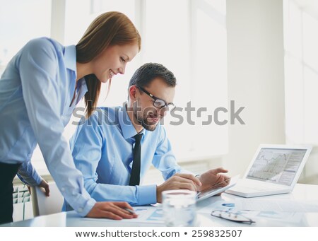 Businessman And Businesswoman With Tablet Pc Сток-фото © Pressmaster