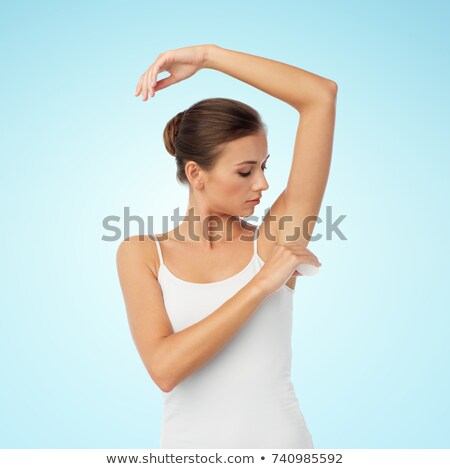 Zdjęcia stock: Woman With Antiperspirant Deodorant Over White
