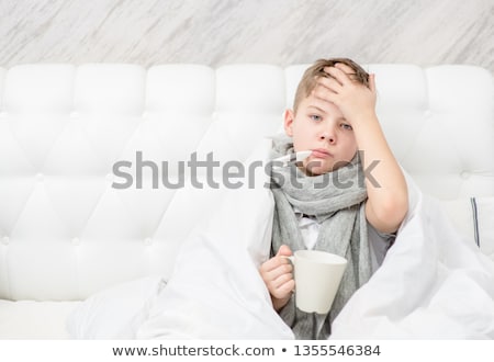 ストックフォト: Sick Boy Drinking Tea In His Bed Sick Child With Fever And Illness In Bed