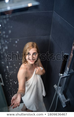 Stockfoto: Pretty Young Woman Taking A Long Hot Shower Washing Her Hair