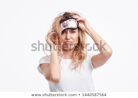 Foto stock: Woman In Pajama And Eye Mask With Coffee Yawning