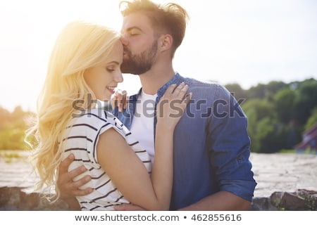 Stock fotó: Onzó · fiatal · pár · átfogó · és · csók