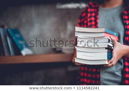 Foto stock: Student Girl With Many Books On White