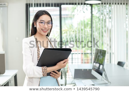 ストックフォト: Attractive Female Secretary Holding Files