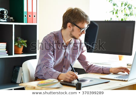 Stockfoto: Artist Drawing Something On Graphic Tablet At The Home Office