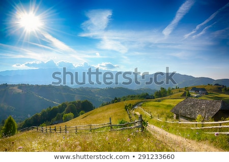 ストックフォト: Evening Sunset On Mountain Hills Of Simon Village Bran