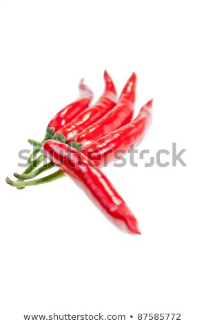Five Red Chilies Pointing At Two Directions Stockfoto © Calvste