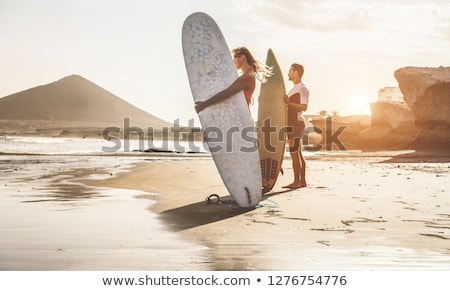 Stock fotó: Couple Of Surfers