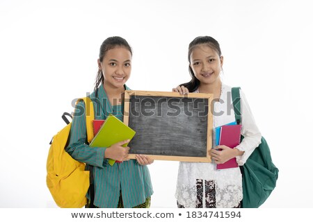 Сток-фото: Two Girls Posing With Empty Board