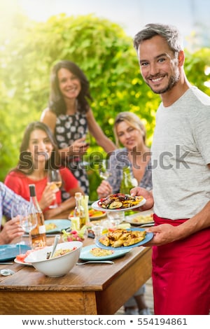 Foto stock: Serving With Laugh
