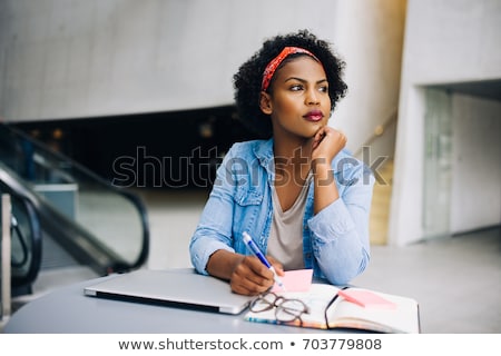 Foto stock: Young Woman Student Thinking