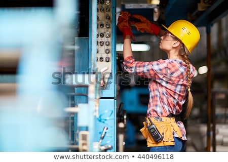 Foto stock: Female Electrician