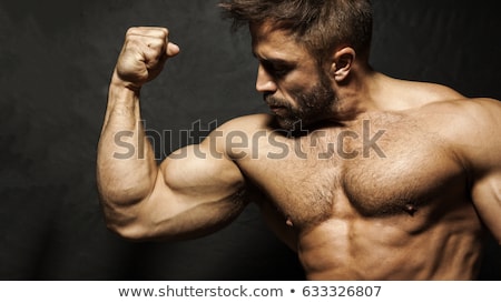 Stockfoto: Muscular Man Flexing