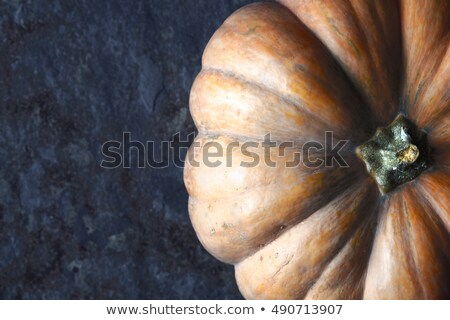 Stock foto: Relief Pumpkin On The Stone Background Top View