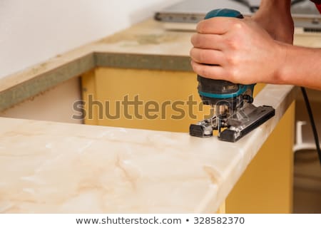 Stock photo: Installing New Induction Hob In Kitchen