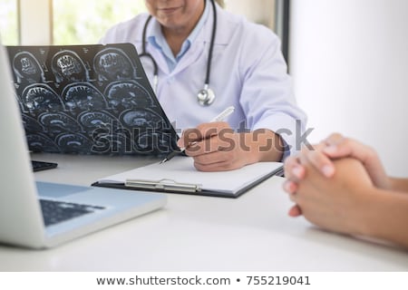 Stock fotó: Professor Doctor Report And Recommend A Method With Patient Trea