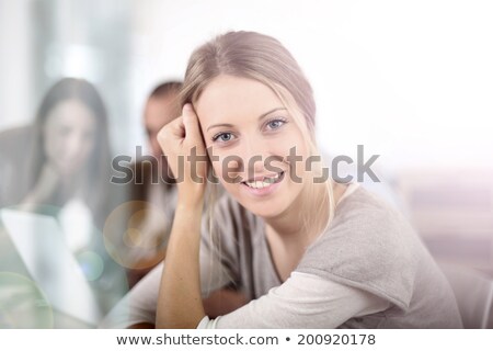 Foto stock: Portrait Of A Young Woman In A Classroom