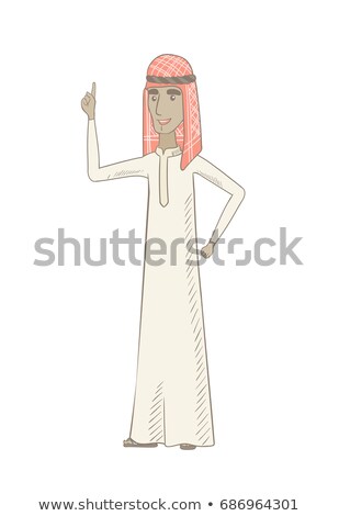 Foto stock: Young Muslim Man Pointing His Forefinger Up