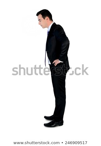 Stok fotoğraf: Side View Of Businessman Looking Down At Something