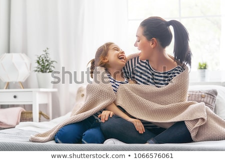 Stok fotoğraf: Girl And Her Mother Enjoy Sunny Morning