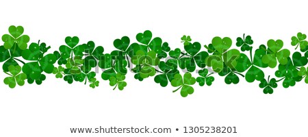 [[stock_photo]]: Green Paper Shamrock On White Background