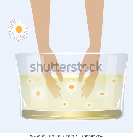 Foto stock: Beautiful Woman In The Bath With Camomile On The Meadow