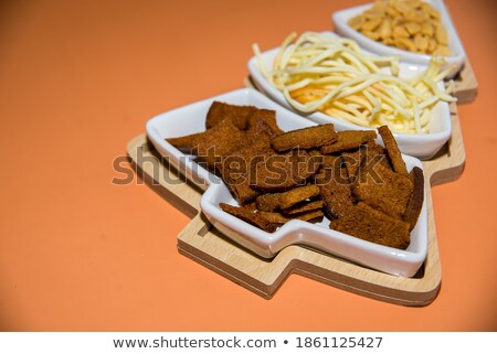 Foto stock: Beer Bottle With Glass And Salted Peanuts Isolated