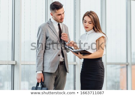 Stok fotoğraf: Secretary Looking At Schedule