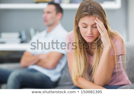 ストックフォト: Couple Sitting Apart In Couch After Quarrel