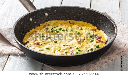Imagine de stoc: Omelette In Frying Pan
