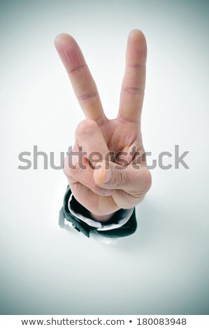 Businessman Giving A V Sign Foto stock © nito