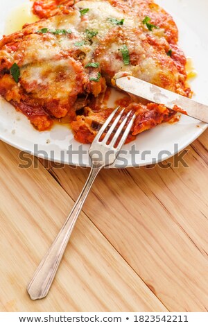 Stock fotó: Eggplant Parmigiana Slice Garnished With Parsley