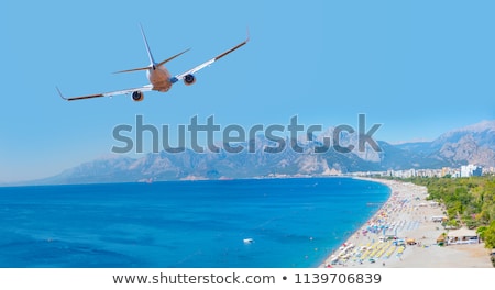 Foto stock: A Passenger Plane At The Beach