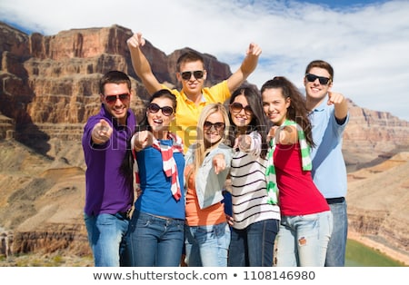 Сток-фото: Friends Pointing At You Over Grand Canyon