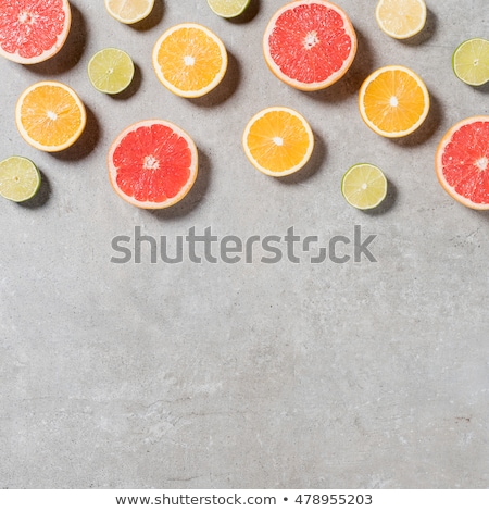 ストックフォト: Close Up Of Citrus Fruits On Stone Table