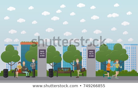 Stock fotó: Businessman Sitting On Bench And Chatting On A Cell Phone With A Happy Expression