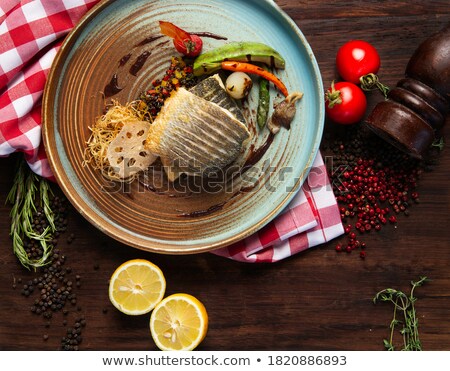 [[stock_photo]]: Green Asparagus On A Wooden Background With A Checkered Tableclo