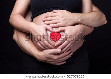 Foto stock: Portrait Of Delighted Parents Expecting A Baby