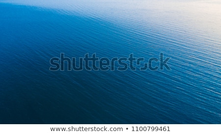 Stockfoto: Aerial View Of Vast Water Surface Blue Lake Or Sea