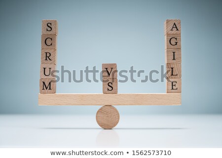 Stok fotoğraf: Wooden Scrum And Agile Blocks On Blue Background