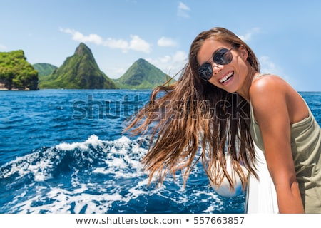 Happy Tourist Girl Having Fun On Boat Ride Towards The Deux Gros Pitons Famous Attraction In St Luc Stockfoto © Maridav