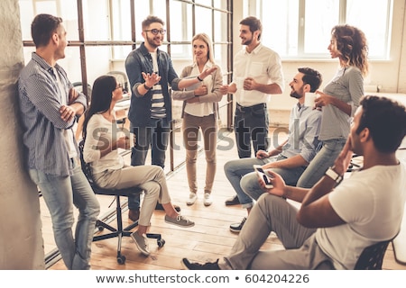 Сток-фото: Business Team Discussing During A Coffee Break