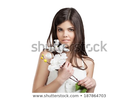 Stok fotoğraf: Woman With Orchid Flower Over Green Background