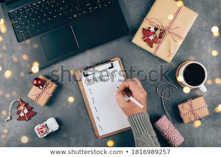 [[stock_photo]]: Writing A Christmas Shopping List